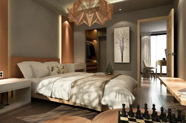 A cozy bedroom in warm neutral tones with a statement headboard